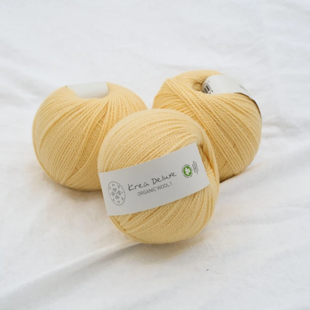 wloczka-merino-krea-deluxe-50g-jasny-zolty.webp