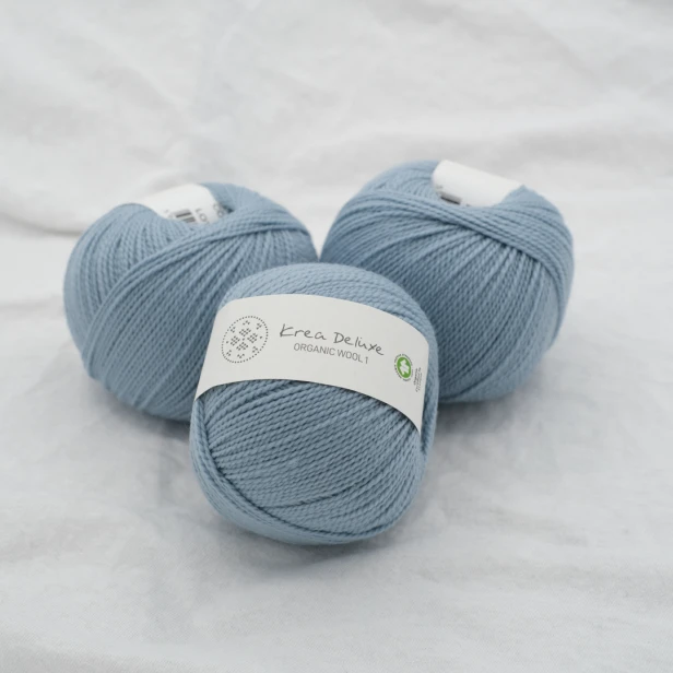 wloczka-merino-krea-deluxe-50g-zgaszony-jasnoniebieski.webp