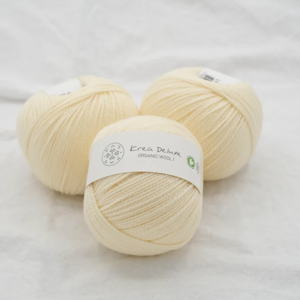 wloczka-merino-krea-deluxe-50g-blady-zolty.webp
