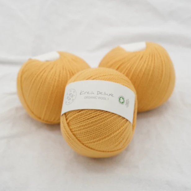 wloczka-merino-krea-deluxe-50g-ciemnozolty.webp