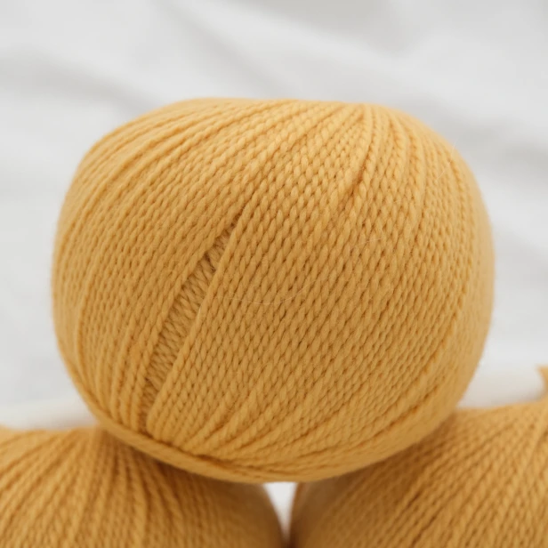 wloczka-merino-krea-deluxe-50g-ciemnozolty-2.webp